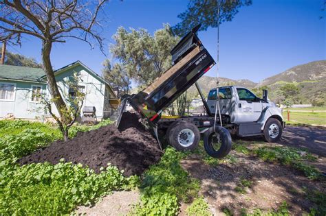 Truck Dropping Off Mulch | Outdoor living, Mulch, Outdoor