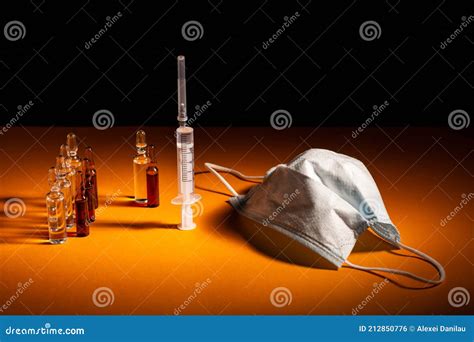 Syringe, Mask and Glass Ampoules for Injections Stock Photo - Image of epidemic, mask: 212850776
