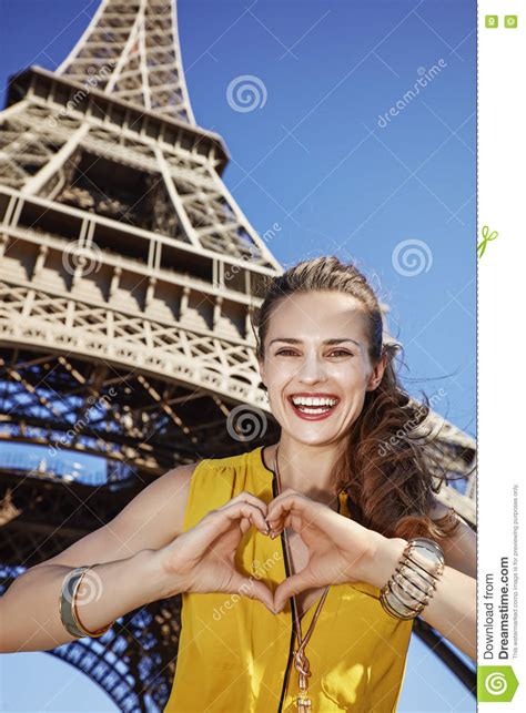Woman Showing Heart Shaped Hands in Front of Eiffel Tower, Paris Stock Image - Image of outdoors ...