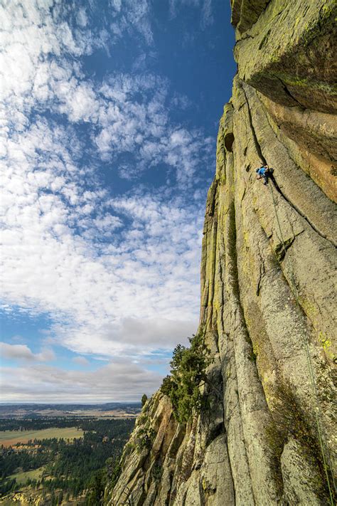 Man Rock Climbing At Devils Tower Photograph by Bennett Barthelemy - Pixels