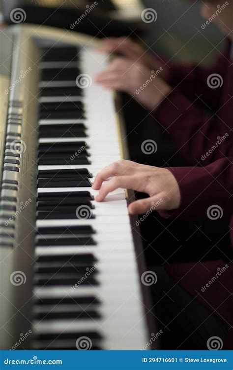 Hands on piano keyboard stock image. Image of children - 294716601