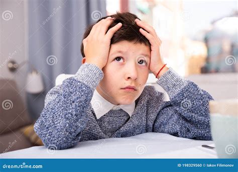 Upset Preteen Boy Sitting At Sofa And Thoughtful About Problems Royalty-Free Stock Image ...