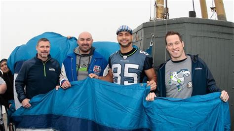 12th MAN Flag Raising at the Space Needle