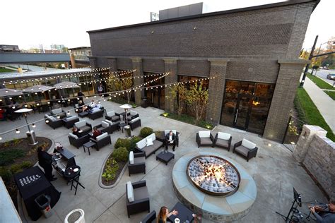 Outdoor event space with a firepit | Event space design, Event venue spaces, Event venue design