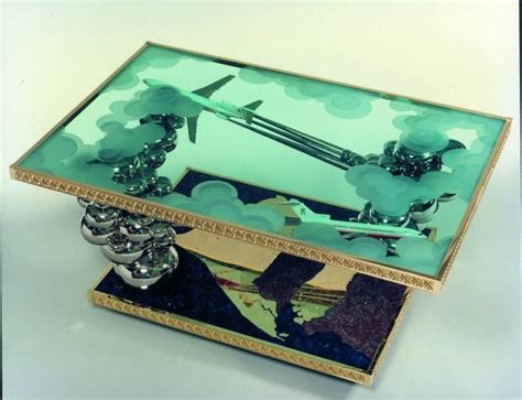 a decorative glass box with an airplane on it