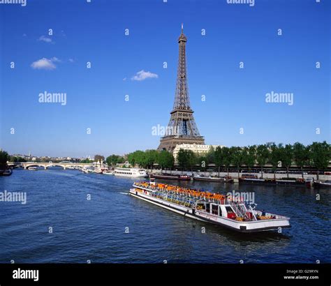 Bateau Mouche on the River Seine with the Eiffel Tower in background, Paris, France Stock Photo ...