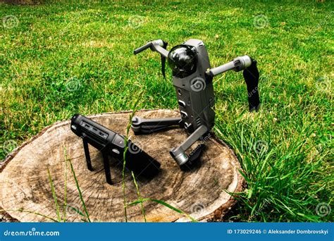 The Drone is Off Lying on the Stump.Grey Copter in Assembled Ready ...