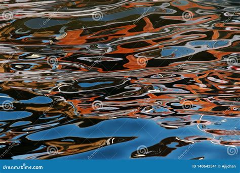 Abstract Reflections of Colours in Water Stock Image - Image of outdoor, colorful: 140642541