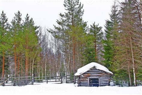 A little hut with snow cover on the roof in forest 9233113 Stock Photo ...