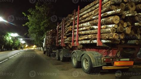 Timber truck loaded with logs. A heavy-duty vehicle with 3044286 Stock Photo at Vecteezy