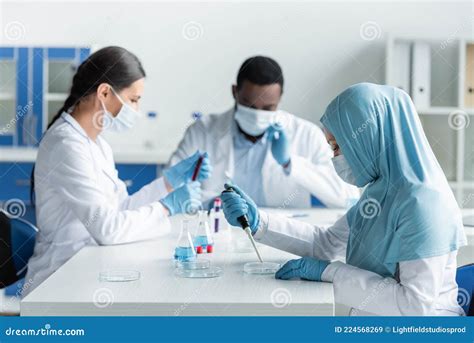 Arabian Scientist in Latex Gloves Using Stock Image - Image of analysis ...