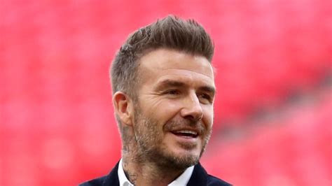 Golden-bald: David Beckham shaves his head