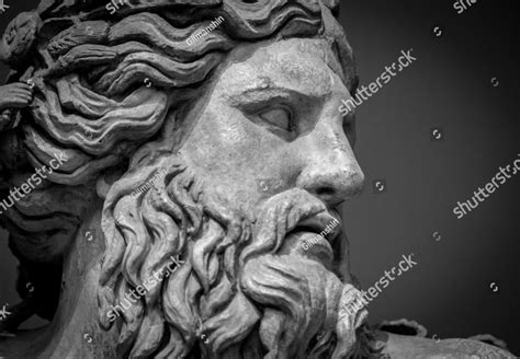 Ancient bust of Nile river god, a black and white photo of a statue of a man with a beard People ...