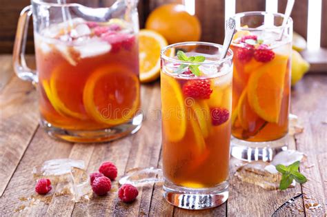 Iced Tea with Orange and Raspberry Stock Image - Image of mint, green ...