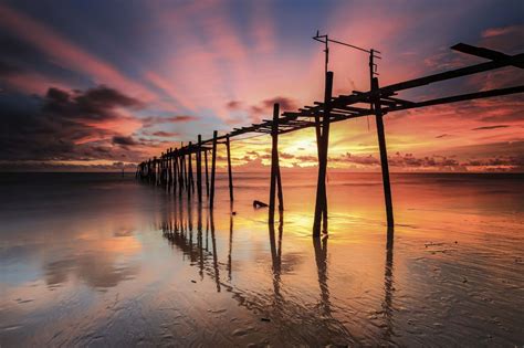 Sunset at The Broken Wooden Bridge | Wooden bridge, Nature photography, Sunset