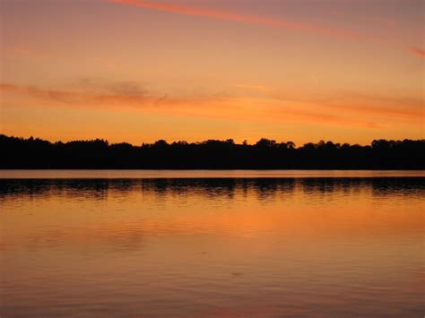 A beautiful orange sunset on Lobster Lake, Minnesota | Smithsonian Photo Contest | Smithsonian ...