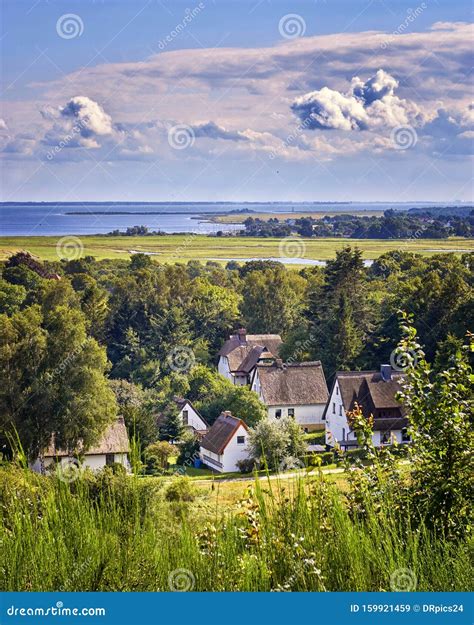 Old Houses Under the Clouds with a View of the Baltic Sea. Germany Stock Image - Image of ...