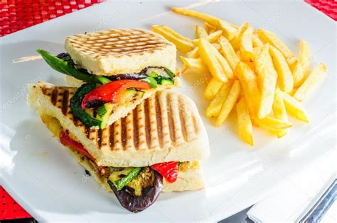 Healthy veggie panini sandwiches with french fries Stock Photo by ©Manowar1973 62443779