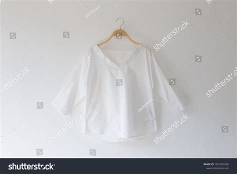 White Color Clothes Clothes Hanger On Stock Photo (Edit Now) 1051065506