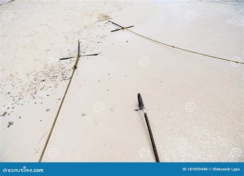 Metal Boat Anchors and Ropes at Sand Stock Photo - Image of grapnel, river: 181059448