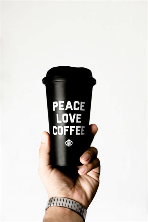 Person Holding Starbucks Coffee Tumbler · Free Stock Photo