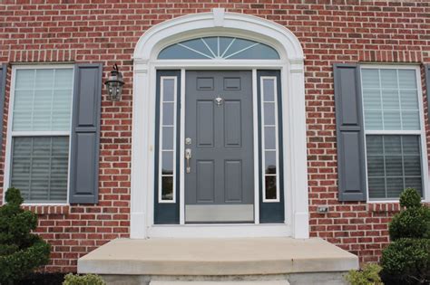 GI. grey front door.shutters match : RiversColorworks+Design