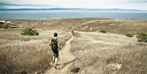 A Family Hikes Across Santa Cruz Island Photograph by Kevin Steele ...