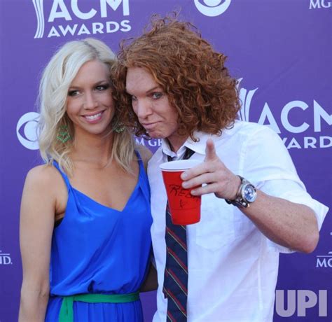 Photo: Comedian Carrot Top (R) and Amanda Hogan arrive at the Academy ...