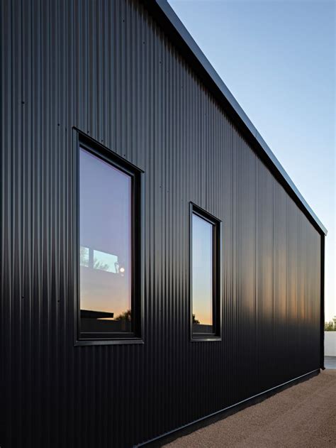 black corrugated metal siding | Black house exterior, Corrugated metal ...