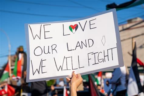 Premium Photo | Palestinian protest sign during a free palestine rally ...