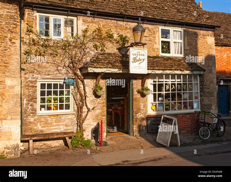 Traditional old fashioned exterior of village bakery shop at Lacock ...