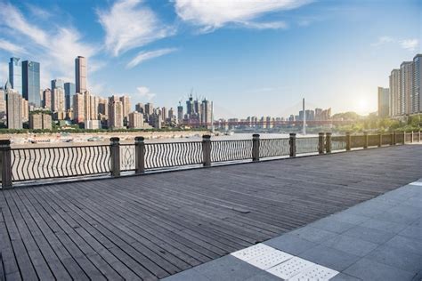 Premium Photo | Chongqing city skyline, with wooden floors and guardrails.