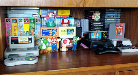 My small, but, proud retro game collection. Famicom, Nes, SFC, SNES, Megadrive/Genesis, Wii/U ...