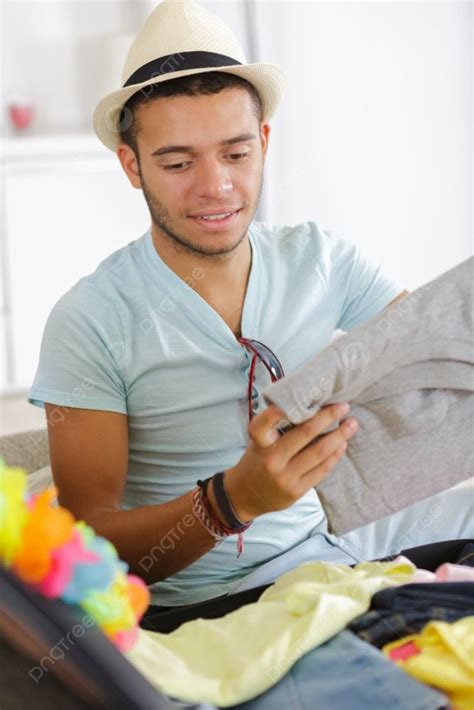 A Young Man Packing Suitcase Photo Background And Picture For Free Download - Pngtree