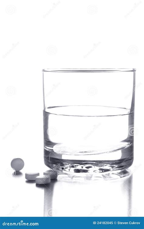 Glass of Water and Pills stock image. Image of antibiotic - 24182045