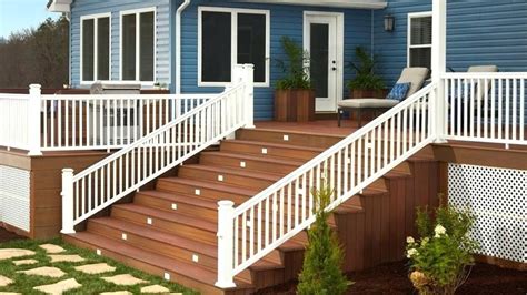 blue house, wood deck, white railing | House exterior blue, Beach house ...