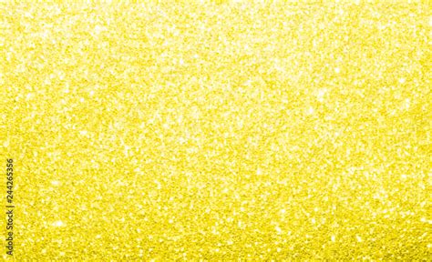 Light pastel yellow, glitter, sparkle and shine abstract background. Excellent backdrop for ...