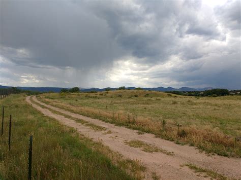 Dirt Road through Field – Photos Public Domain