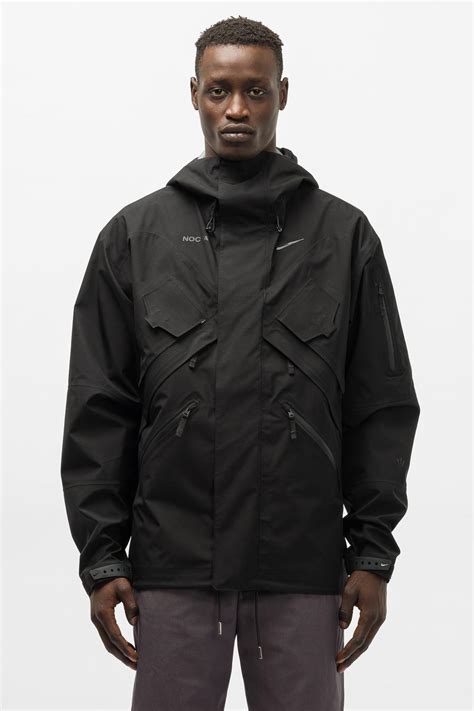 Nike NOCTA limited edition men’s standard fit black polyester hooded rain jacket. : r/TechWear