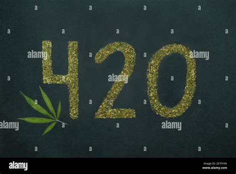 420 made with marijuana, and beautiful cannabis leaf on black ...