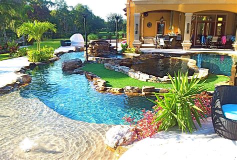 backyard oasis lazy river pool with island lagoon and jacuzzi in the middle #BunnyCouture | I ...