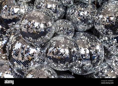 Silver disco balls background Stock Photo - Alamy