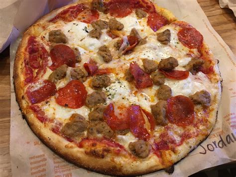 [I ate] Sausage and pepperoni pizza with mozzarella and ricotta cheese. : r/food