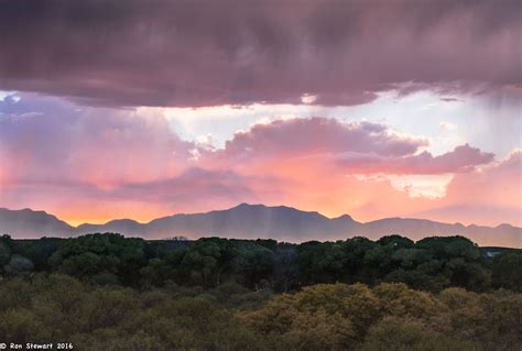 An autumn sunset lights up the Huachuca Mountains and San Pedro RIver in southeastern Arizona ...