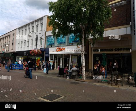 A 1009040 Sutton High Street Showing a Selection of Shops Stock Photo - Alamy