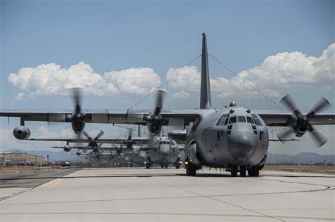 Seven U.S. Air Force EC-130H jamming planes do the “Elephant Walk” in Arizona