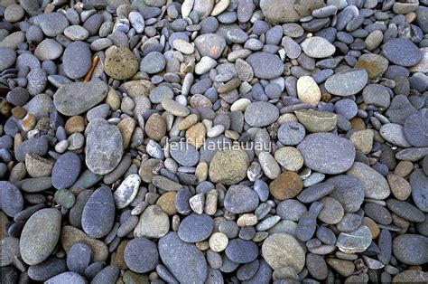 "Pattern of smooth rocks along an ocean beach" by Jeff Hathaway | Redbubble