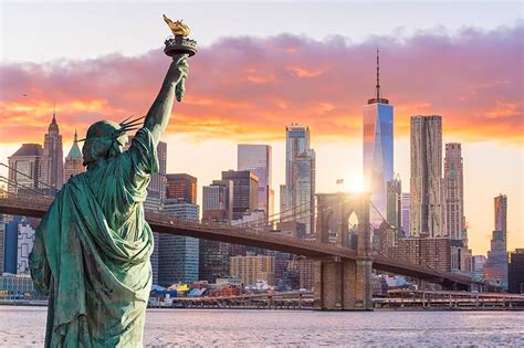 Statue Liberty and New York city skyline at sunset - Kenny Leon's True ...