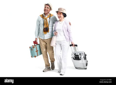 Happy travel elderly couple Stock Photo - Alamy