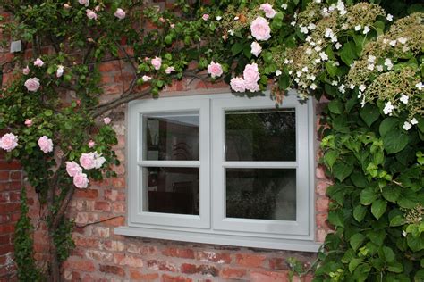 Agate Grey Storm 2 Upvc Window with 36mm bar | Cottage windows, Windows exterior, Red brick house